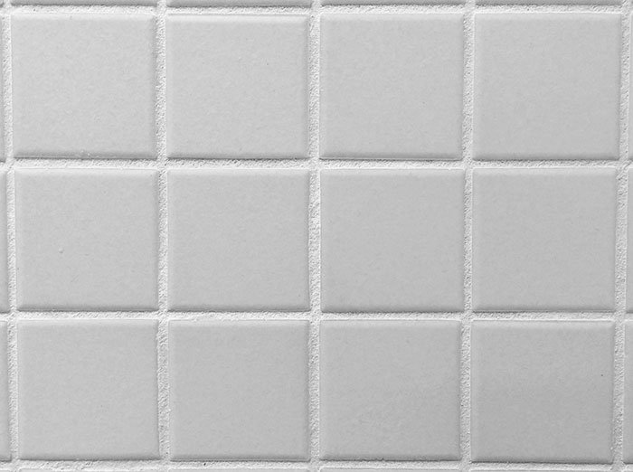 modern white square wall tiles with white grout in-between